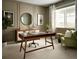 Home office featuring a modern desk, a comfortable chair, and ample natural light at 4090 Estrella St, Brighton, CO 80601