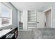 Bedroom with built-in closet shelves and natural light at 11041 Newland St, Westminster, CO 80020
