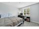 Bedroom featuring a modern desk and a window with natural light at 11041 Newland St, Westminster, CO 80020