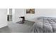 Bedroom featuring gray carpet, an exercise bench, and a motorcycle print at 11041 Newland St, Westminster, CO 80020