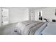 Spacious bedroom with plush carpeting, ensuite bathroom, and large walk-in closet for ample storage at 11041 Newland St, Westminster, CO 80020