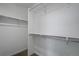 Spacious walk in closet featuring carpet and adjustable shelves at 8711 E Hampden Ave # 6, Denver, CO 80231