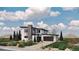 Contemporary home showcasing sleek architecture, lush landscaping, and a welcoming driveway at 5052 Nile Ct, Golden, CO 80403
