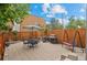 Fully fenced backyard with patio seating area and grill and swing, perfect for entertaining at 1038 E 4Th Ave, Denver, CO 80218