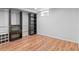 Finished basement area with closet-style shelving and storage and fresh, neutral color palette at 1038 E 4Th Ave, Denver, CO 80218