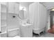 Classic white bathroom with clawfoot tub and vintage-style fixtures at 1038 E 4Th Ave, Denver, CO 80218