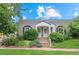 Charming home with well-maintained landscaping and a cozy entrance, evoking a sense of warmth and curb appeal at 1038 E 4Th Ave, Denver, CO 80218