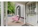 Cozy front porch with seating, enhancing the home's charm and offering a relaxing outdoor space at 1038 E 4Th Ave, Denver, CO 80218
