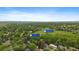 Expansive aerial view showcases the home's proximity to open green space and the surrounding neighborhood at 116 Monarch St, Louisville, CO 80027