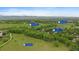 Stunning aerial view of a home near Callahan Open Space, Keith Helart Park, and North Open Space with mountain views at 116 Monarch St, Louisville, CO 80027