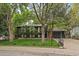 Charming two-story home with well-manicured lawn and mature trees, enhancing curb appeal at 116 Monarch St, Louisville, CO 80027