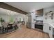 Kitchen with stainless steel appliances overlooks the dining and living areas, promoting an open layout at 116 Monarch St, Louisville, CO 80027