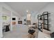 Spacious living area features a fireplace, shelving, and modern decor at 116 Monarch St, Louisville, CO 80027