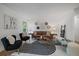 Bright living room with stylish decor, a comfortable seating area, and abundant natural light at 116 Monarch St, Louisville, CO 80027