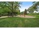 Charming playground area with picnic tables and climbing rocks, great for Gathering fun and gatherings at 116 Monarch St, Louisville, CO 80027