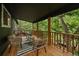 Charming porch with comfortable seating amidst lush greenery at 116 Monarch St, Louisville, CO 80027