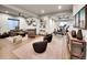 Finished basement with living area, exercise equipment and neutral color palette at 6736 S Flanders Ct, Aurora, CO 80016