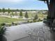 Relaxing outdoor area with comfortable seating, a stylish rug, and picturesque views at 6736 S Flanders Ct, Aurora, CO 80016