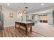 Kitchenette with island and living room beyond at 731 Weston Rd, Larkspur, CO 80118