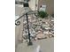 Property exterior featuring decorative rocks and a black handrail with HomeSmart realty sign at 13349 W Alameda W Pkwy # 102, Lakewood, CO 80228