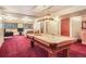 Finished basement featuring a pool table, recessed lighting, and a cozy sitting area at 18680 Arrowwood Dr, Monument, CO 80132