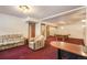 Basement with a desk, sitting area, and a pool table making it an ideal entertainment space at 18680 Arrowwood Dr, Monument, CO 80132