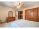 Bedroom with furniture, closet, and view into hall at 18680 Arrowwood Dr, Monument, CO 80132