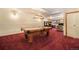 Basement game room with pool table, desk, and bonus seating at 18680 Arrowwood Dr, Monument, CO 80132