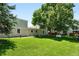 Picture of a large grassy backyard area, perfect for outdoor activities or relaxation at 1050 S Monaco Pkwy # 125, Denver, CO 80224