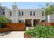 Charming townhouse with well-maintained landscaping and a private fenced yard at 1050 S Monaco Pkwy # 125, Denver, CO 80224
