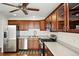 Modern kitchen equipped with stainless steel appliances and plenty of cabinet space at 1050 S Monaco Pkwy # 125, Denver, CO 80224