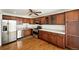 Well-appointed kitchen with stainless steel appliances and ample counter space at 1050 S Monaco Pkwy # 125, Denver, CO 80224
