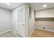 Basement laundry area with storage cabinets, perfect for keeping things tidy at 1050 S Monaco Pkwy # 125, Denver, CO 80224
