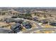 Expansive aerial view of a residential neighborhood featuring well-maintained homes and tree-lined streets at 21854 Tyrolite Ave, Parker, CO 80138