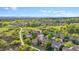 Panoramic aerial view highlighting the neighborhood and scenic landscape with mountain views in the distance at 22302 Quail Run Way, Parker, CO 80138