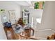 Upstairs view of living room with fireplace, seating, and plenty of natural light at 22302 Quail Run Way, Parker, CO 80138
