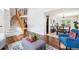 Open-concept space with hardwood floors, leading into the dining room at 22302 Quail Run Way, Parker, CO 80138