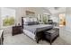 Bright bedroom with a large bed, vaulted ceiling, and comfortable furniture at 22302 Quail Run Way, Parker, CO 80138