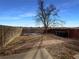 Small backyard with wooden fence and shed at 4974 E 124Th Way, Thornton, CO 80241