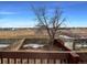 View of backyard from deck, with shed and open space at 4974 E 124Th Way, Thornton, CO 80241