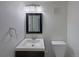 Simple bathroom with single sink vanity and toilet at 4974 E 124Th Way, Thornton, CO 80241