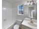 Clean bathroom with bathtub, toilet and vanity at 4974 E 124Th Way, Thornton, CO 80241