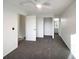 Spacious bedroom with ceiling fan and walk-in closet at 4974 E 124Th Way, Thornton, CO 80241