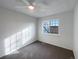 Cozy bedroom with carpet and large window at 4974 E 124Th Way, Thornton, CO 80241