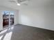 Bright bedroom with sliding glass door to deck at 4974 E 124Th Way, Thornton, CO 80241