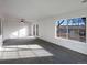 Spacious Gathering room with sliding glass door to backyard at 4974 E 124Th Way, Thornton, CO 80241