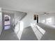 Bright living room with stairs and entryway view at 4974 E 124Th Way, Thornton, CO 80241