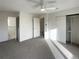 Main bedroom with ensuite bathroom and walk-in closet at 4974 E 124Th Way, Thornton, CO 80241
