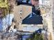 Aerial view of house with solar panels on roof at 6148 W Pacific Cir, Lakewood, CO 80227