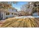 Spacious backyard with shed, patio, and mature trees at 6148 W Pacific Cir, Lakewood, CO 80227